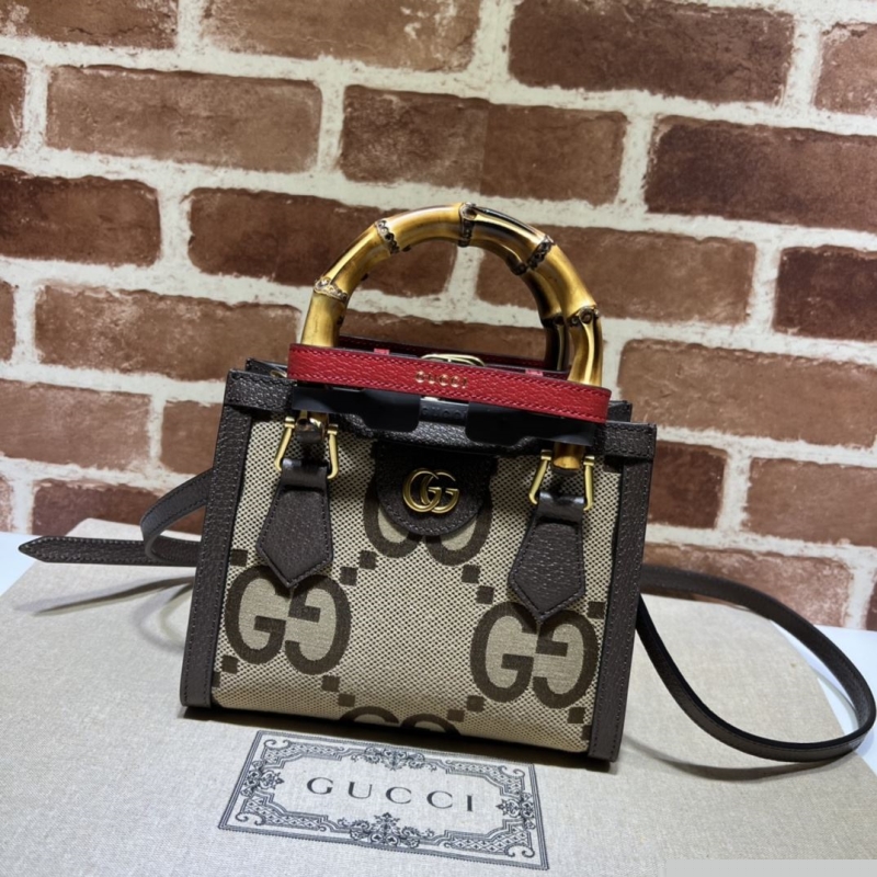 G*u*i top handle bags
